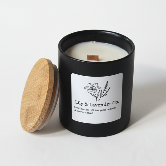 Lily & Lavender Co. Non-Toxic Coconut wax & Beeswax 15oz candle in black vessel with wood lid.