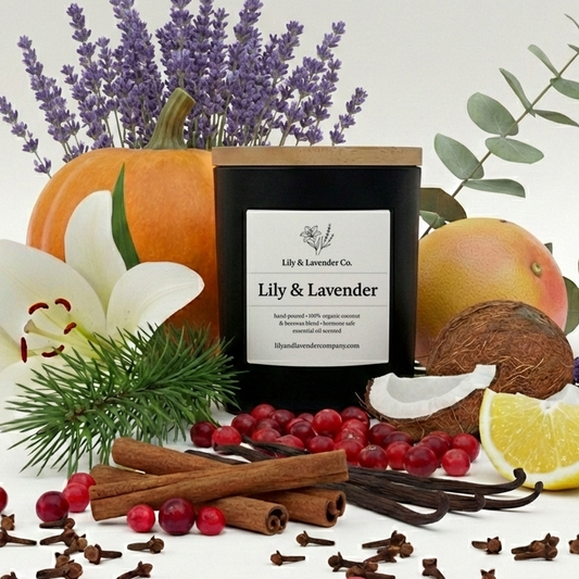 Non-Toxic, Essential Oil Scented Coconut and Beeswax Candle labeled 'Lily & Lavender' surrounded by pumpkins, flowers, fruits, and spices representing various scents you can choose from.