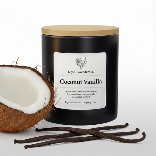 Lily & Lavender Co. Coconut & Vanilla, Essential Oil Scented, Non-Toxic Coconut & Beeswax Candle with half a coconut and vanilla beans on a white background.