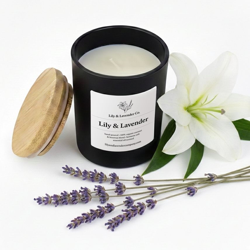 Lily & Lavender Co. Essential Oil Scented labeled 'Lily & Lavender' with a wooden lid, surrounded by white lilies and lavender flowers on a white background.