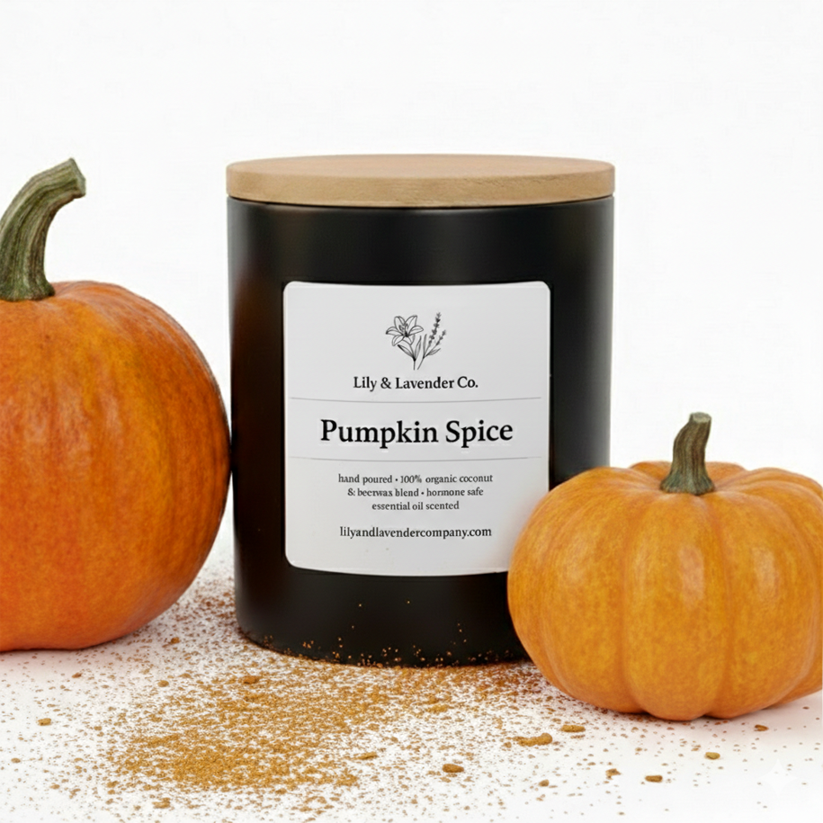Lily & Lavender Co. Pumpkin Spice, Essential Oil Scented, Non-Toxic Coconut & Beeswax Candle surrounded by pumpkins and pumpkin spice.