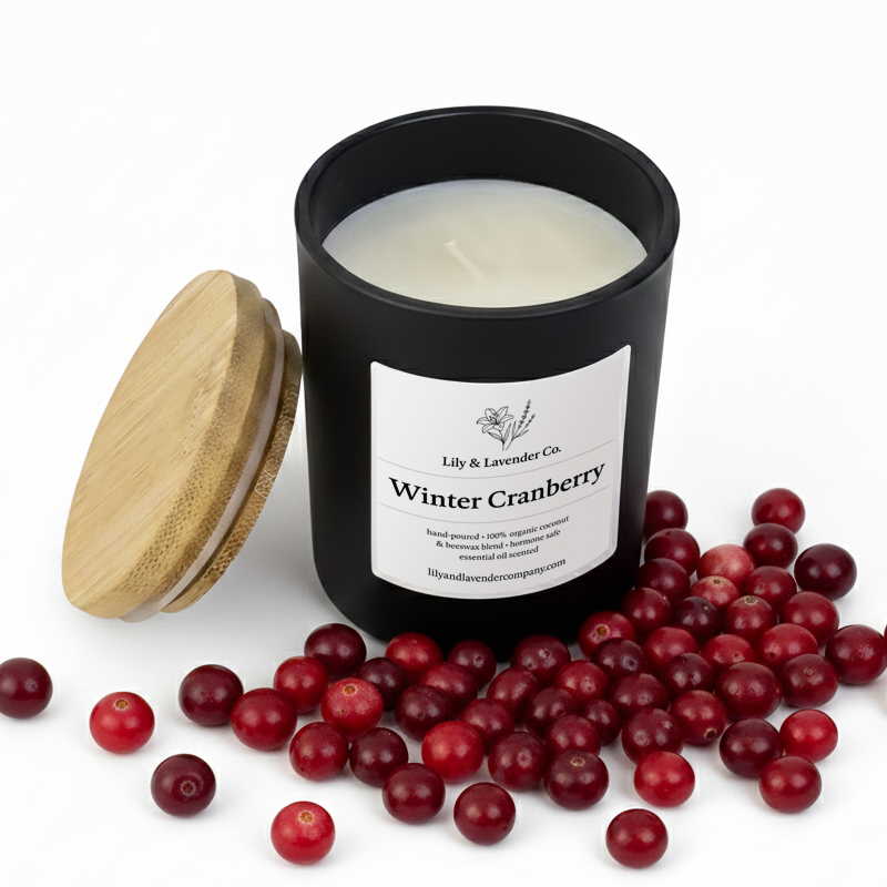 Lily & Lavender Co. Winter Cranberry, Essential Oil Scented, Non-Toxic Coconut & Beeswax Candle surrounded by cranberries.