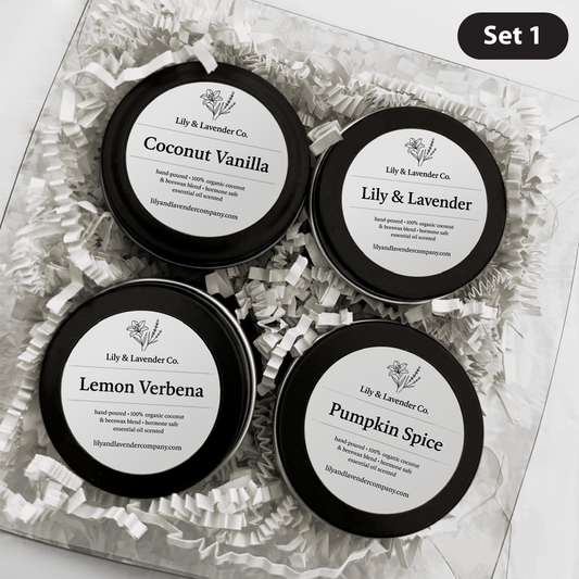 Set 1 - Four tins of Lily & Lavender Co. essential oils scented candles in a decorative box.