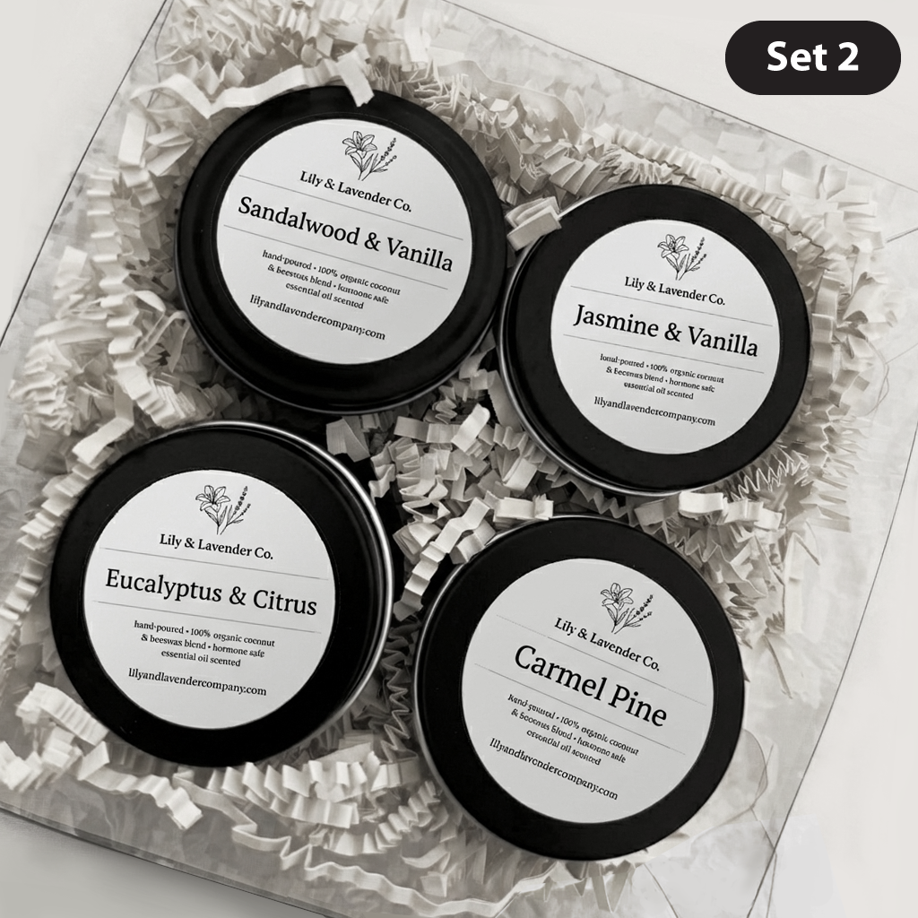 Set 2 - Four tins of Lily & Lavender Co. essential oils scented candles in a decorative box.